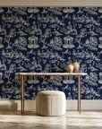 Garden Folly Midnight pastoral toile wallpaper on the wall of a grand entry foyer