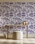Garden Folly Plum pastoral toile wallpaper on the wall of a grand entry foyer