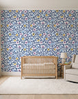 Garden Reverie Midnight floral wallpaper in a calm, light-filled nursery