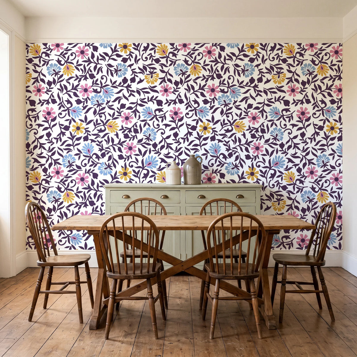 Garden Reverie Plum floral wallpaper in a farmhouse dining room with a sage sideboard and rustic trestle table