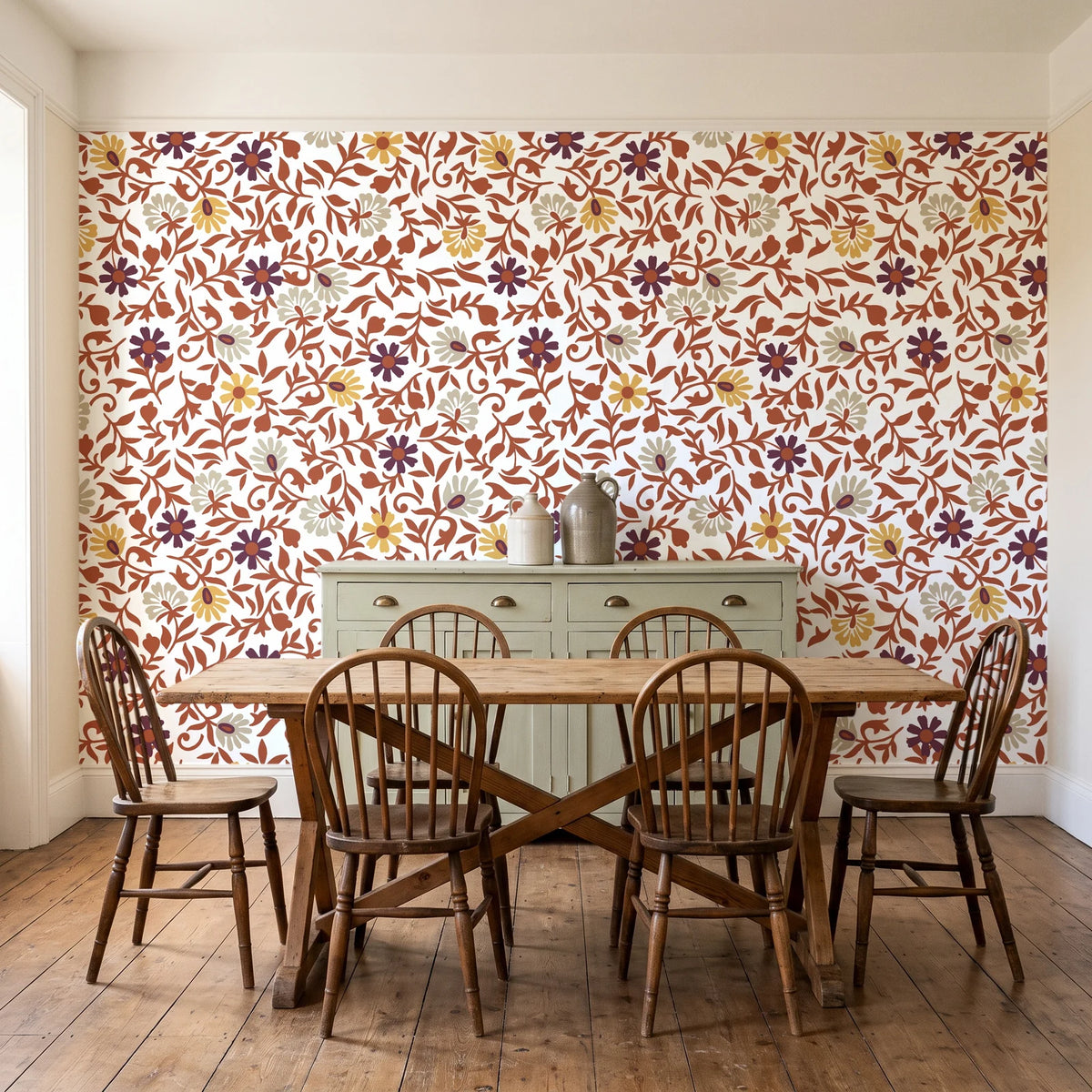 Garden Reverie Terracotta floral wallpaper in a farmhouse dining room with a sage sideboard and rustic trestle table