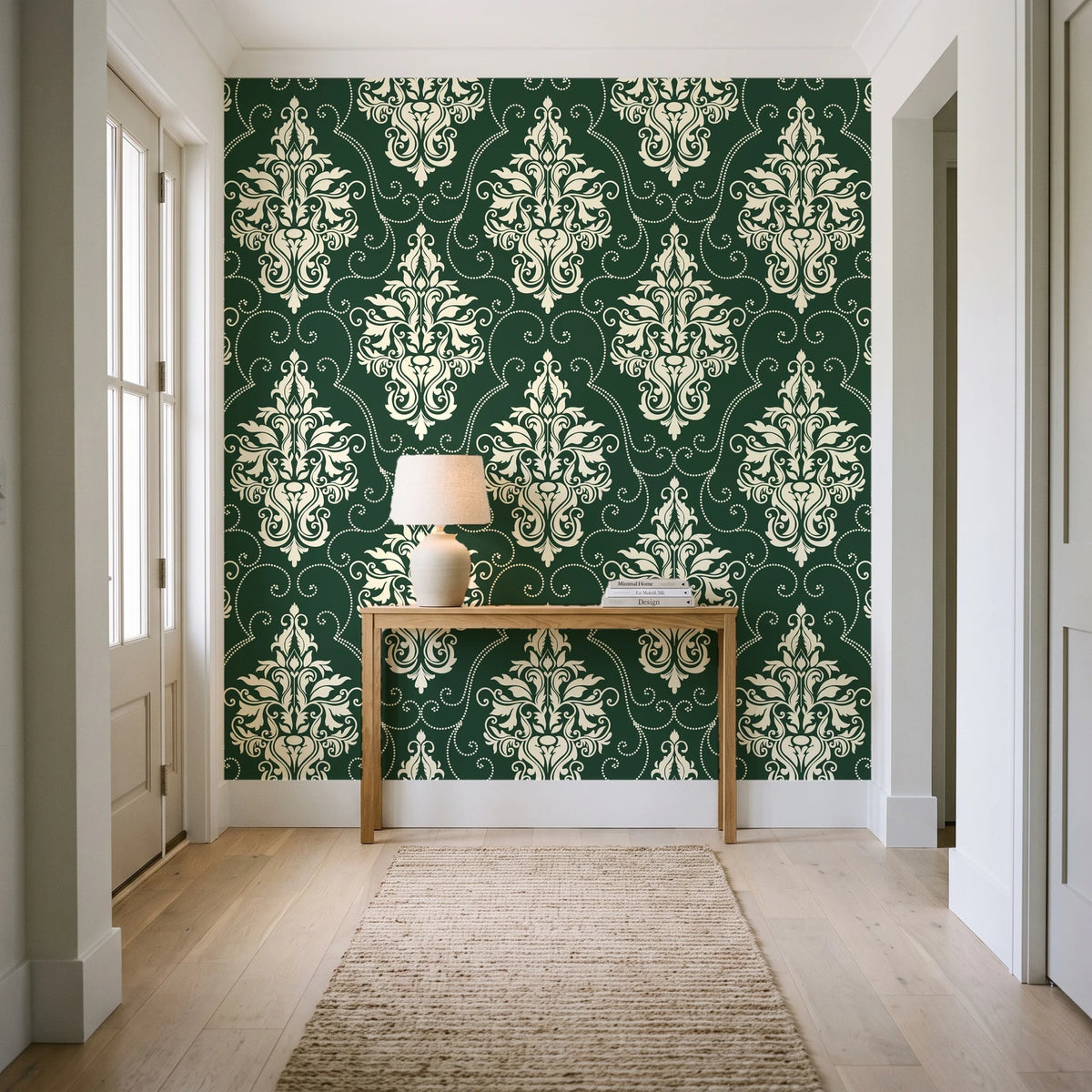 Gentlebotan Forest botanical damask wallpaper behind a console table in a light entry hallway