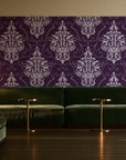 Gentlebotan Plum botanical damask wallpaper in an intimate luxury cocktail lounge