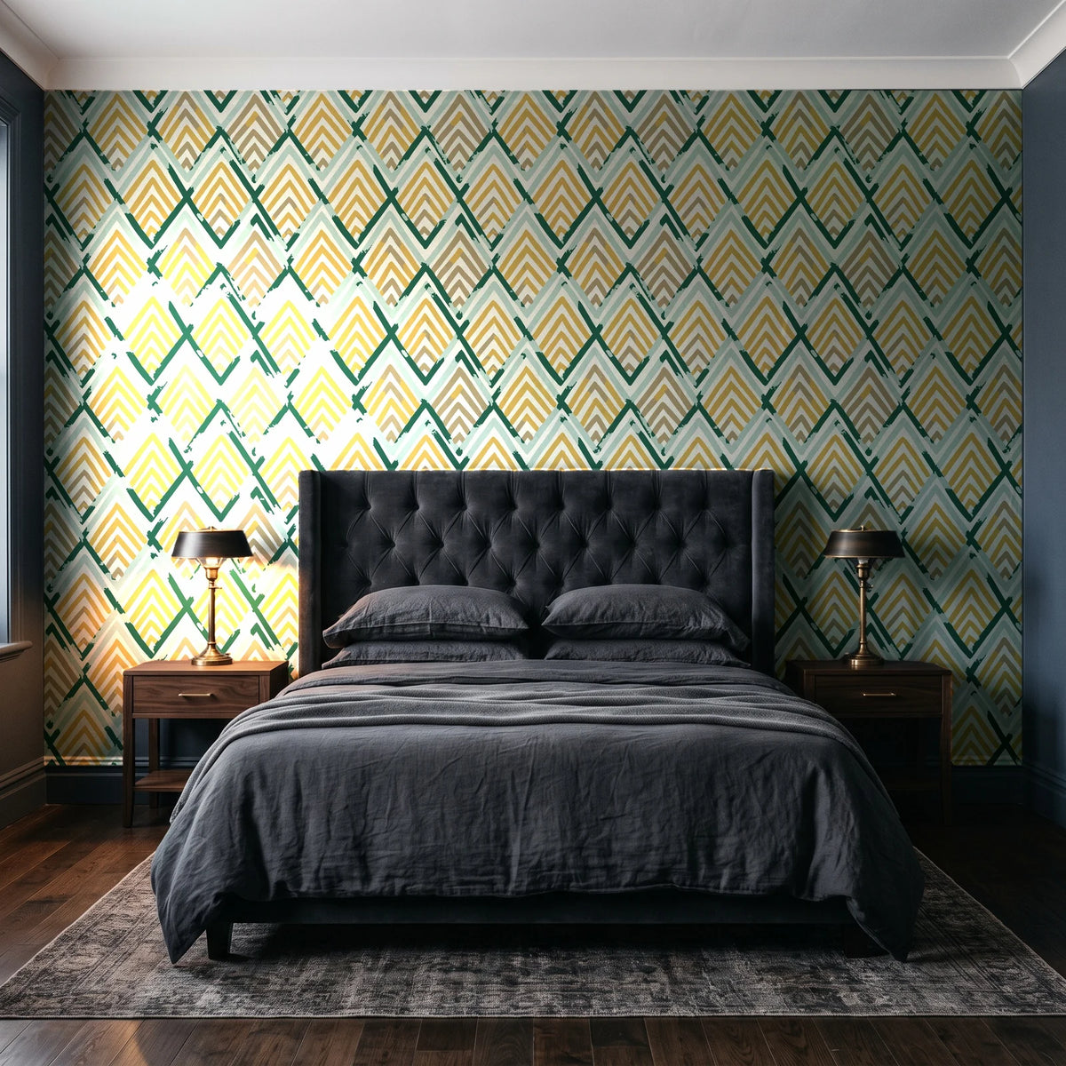 Gilded Crossing Emerald chevron geometric wallpaper behind a tufted headboard in a dark, moody bedroom