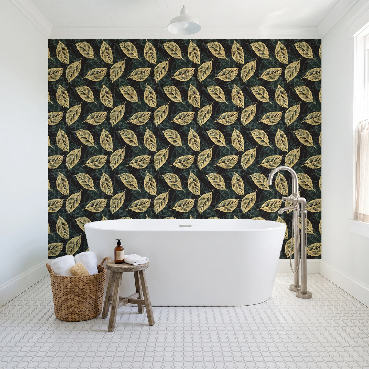 Gilded Frond Noir leaf wallpaper behind a freestanding tub in a bright coastal bathroom