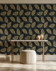 Gilded Frond Noir leaf wallpaper on the wall of a grand entry foyer