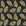Gilded Frond Noir leaf wallpaper in black and gold