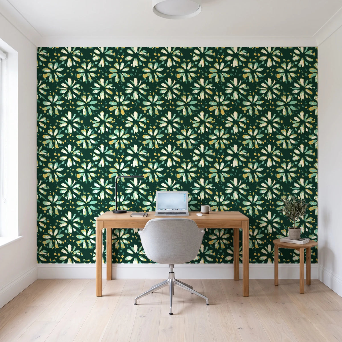 Gilt Scatter Emerald floral scatter wallpaper behind a modern oak desk in a bright home office