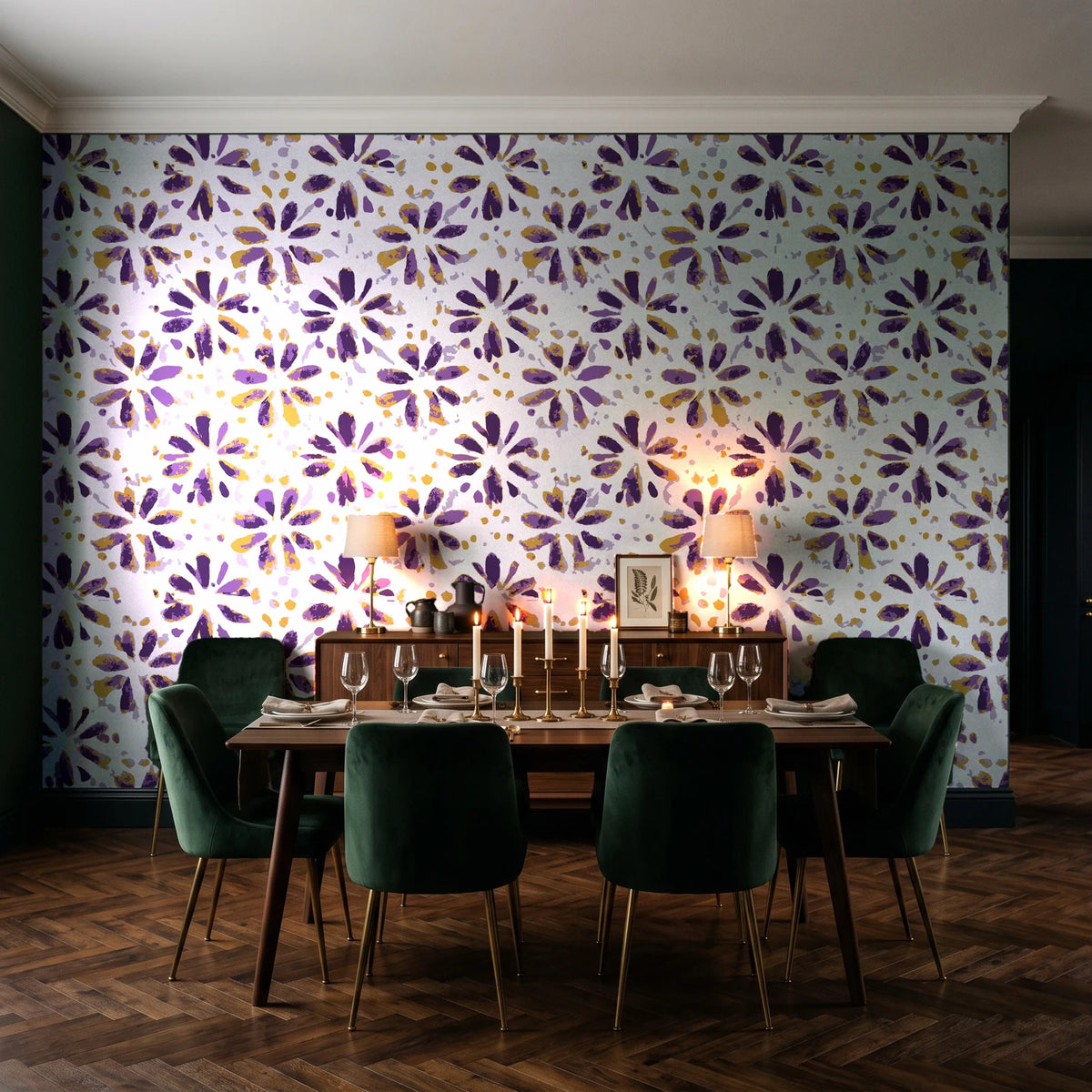 Gilt Scatter Plum floral scatter wallpaper in a dark moody dining room with a candlelit table