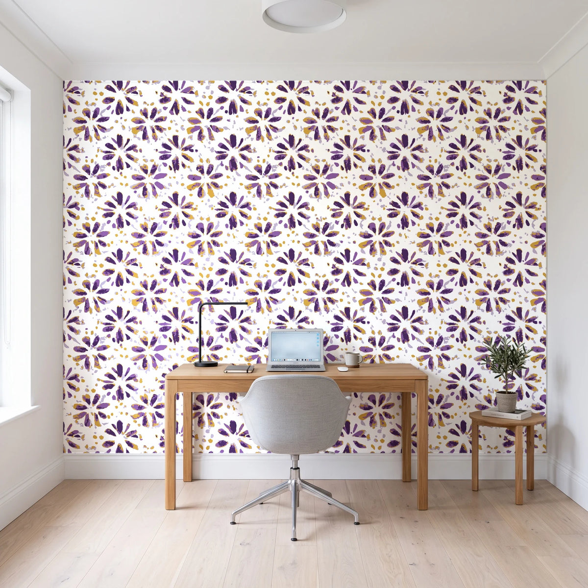 Gilt Scatter Plum floral scatter wallpaper behind a modern oak desk in a bright home office