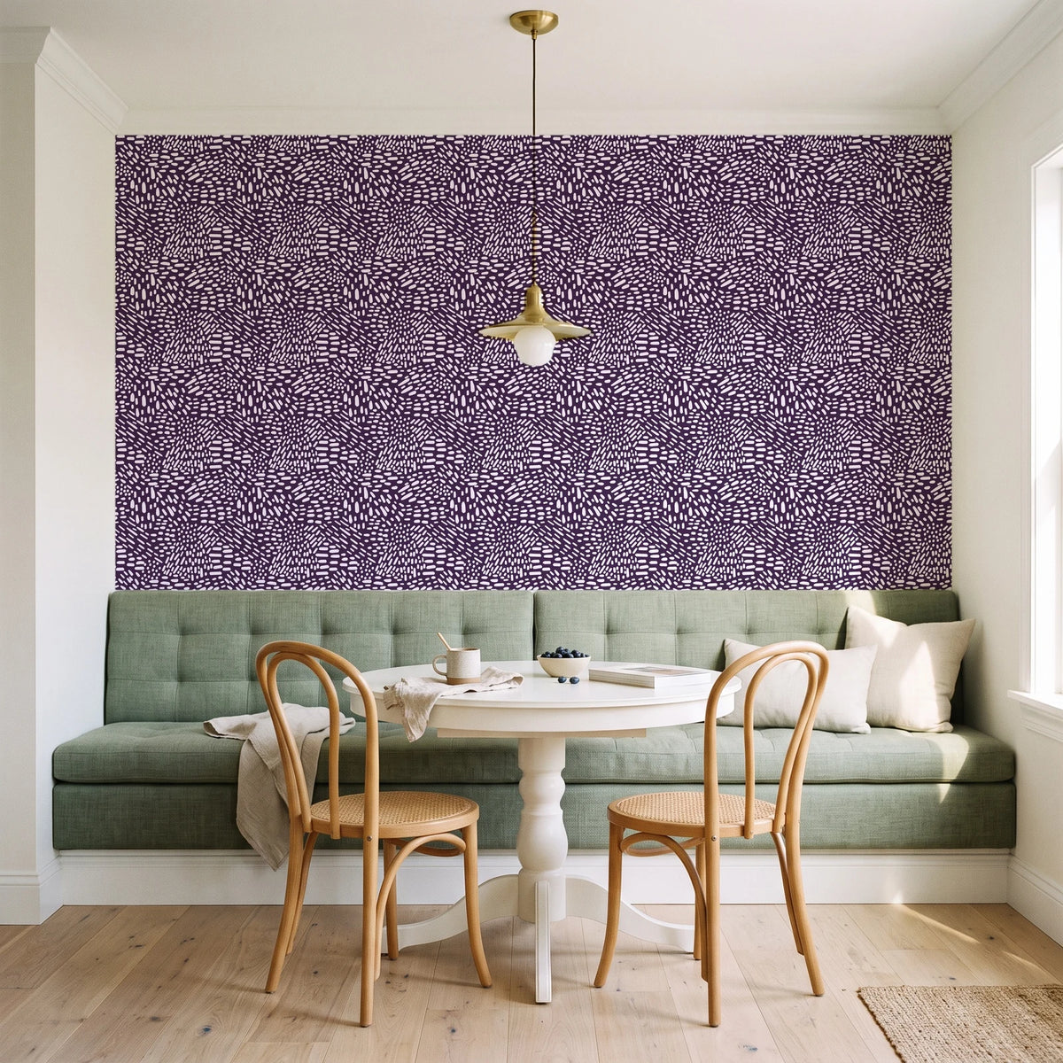 Grain Shift Aubergine minimalist dash wallpaper as a feature wall in a sunlit breakfast nook