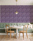 Grain Shift Aubergine minimalist dash wallpaper as a feature wall in a sunlit breakfast nook