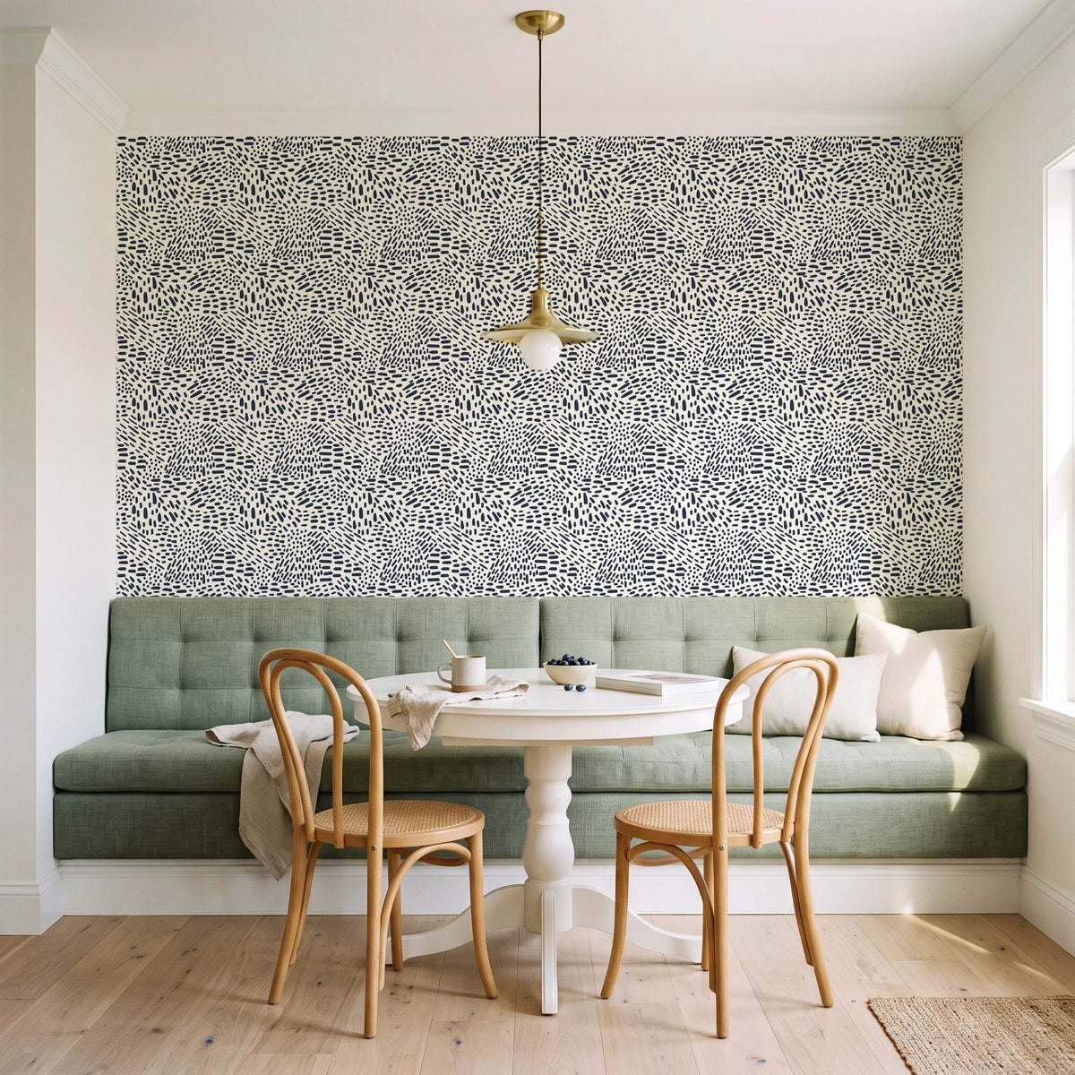 Grain Shift Oatmeal minimalist dash wallpaper as a feature wall in a sunlit breakfast nook