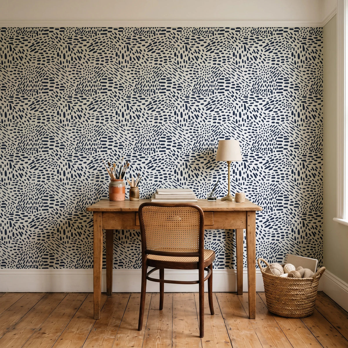 Grain Shift Oatmeal minimalist dash wallpaper behind a vintage writing desk in a cozy craft-room home office