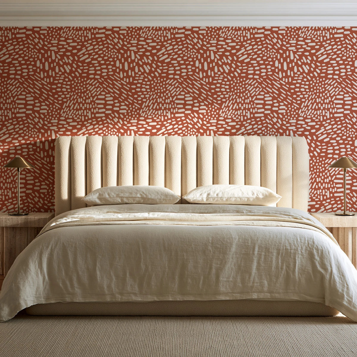 Grain Shift Terracotta minimalist dash wallpaper behind a channel-tufted bed in a calm primary bedroom