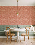 Grain Shift Terracotta minimalist dash wallpaper as a feature wall in a sunlit breakfast nook
