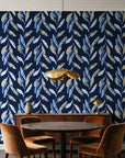 Hanging Garden Midnight botanical wallpaper behind a walnut credenza and round table in an elegant dining room