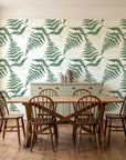 Harbor Fern Moss fern wallpaper in a farmhouse dining room with a sage sideboard and rustic trestle table