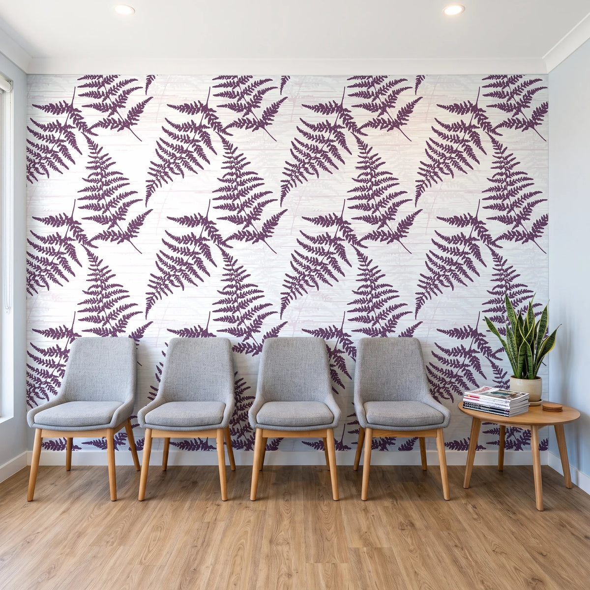 Harbor Fern Plum fern wallpaper behind a row of upholstered chairs in a bright clinic waiting room