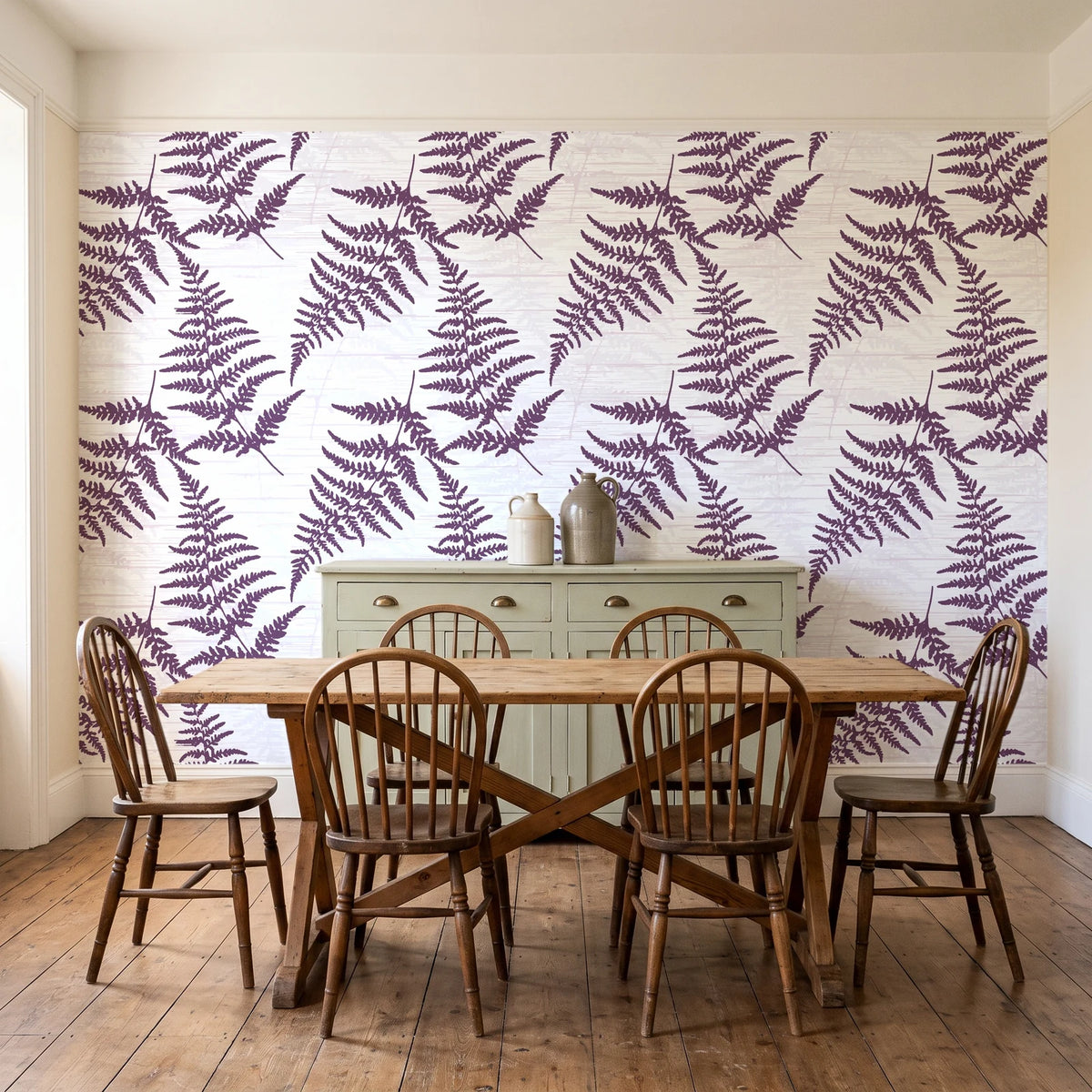 Harbor Fern Plum fern wallpaper in a farmhouse dining room with a sage sideboard and rustic trestle table