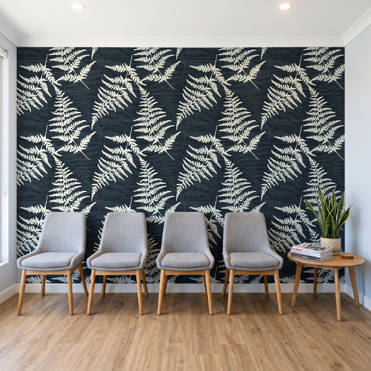 Harbor Fern Slate fern wallpaper behind a row of upholstered chairs in a bright clinic waiting room