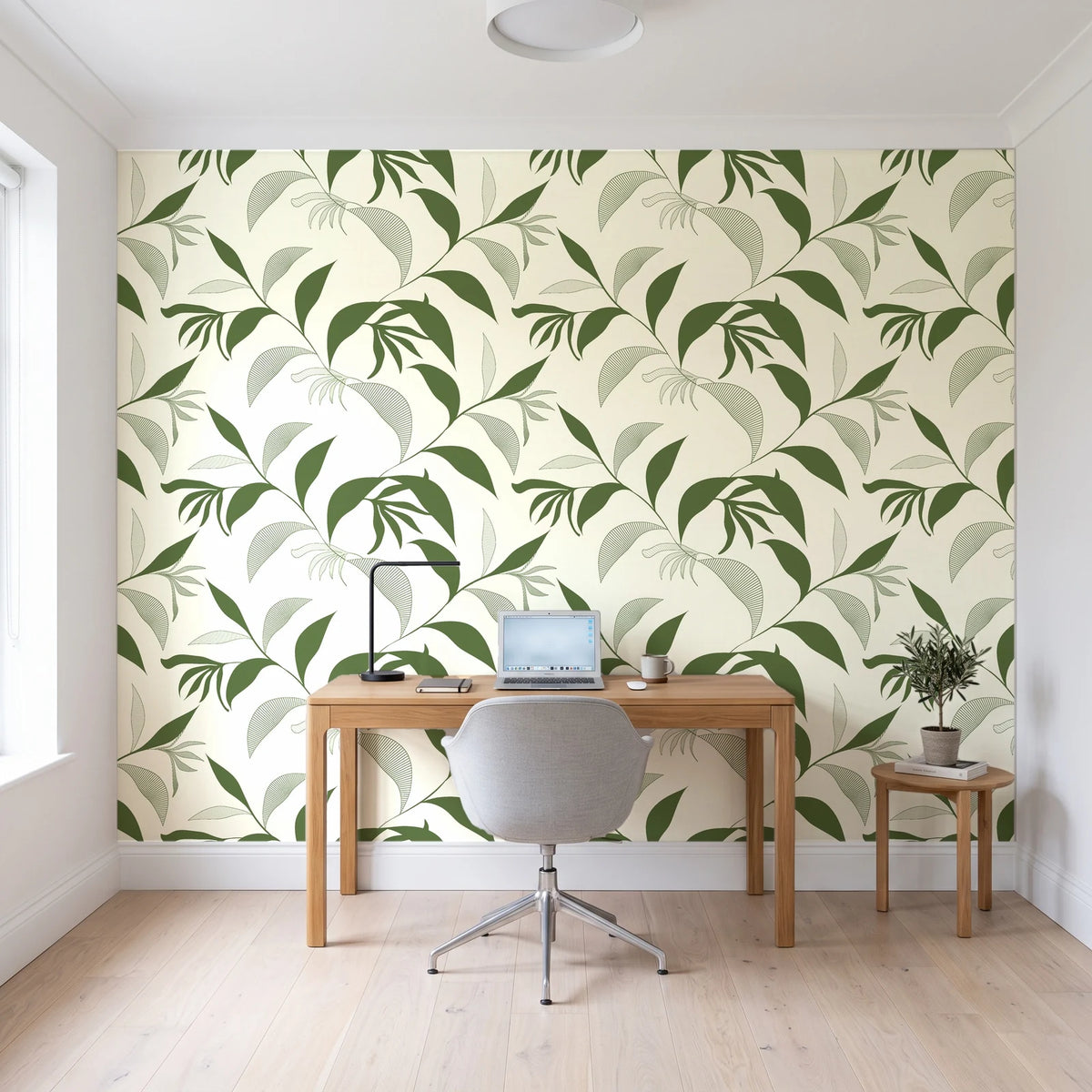 Hatched Frond Moss hatched frond wallpaper behind a modern oak desk in a bright home office