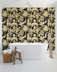 Hush & Palm Ebony palm trees wallpaper behind a freestanding tub in a bright coastal bathroom