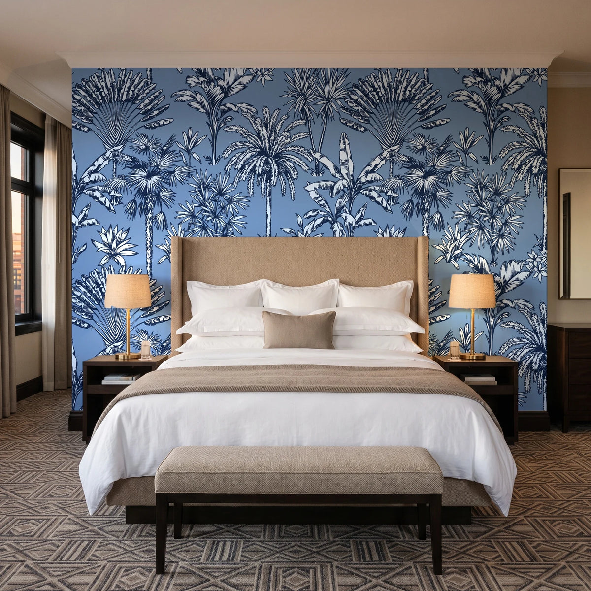 Hush & Palm Midnight palm trees wallpaper behind the headboard of a king bed in a contemporary hotel guest room