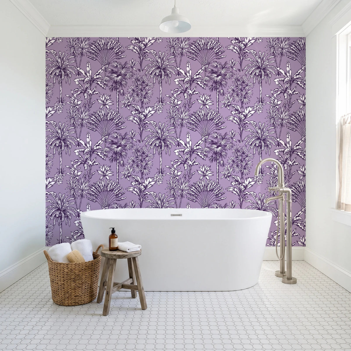 Hush & Palm Plum palm trees wallpaper behind a freestanding tub in a bright coastal bathroom