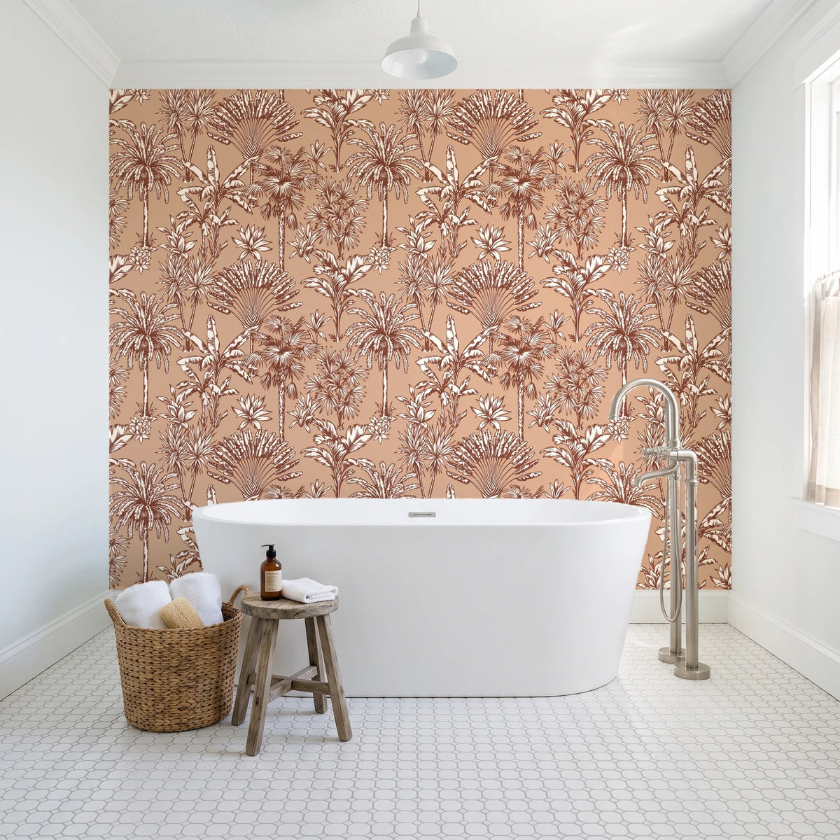 Hush & Palm Terracotta palm trees wallpaper behind a freestanding tub in a bright coastal bathroom