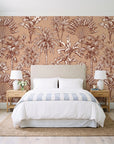 Hush & Palm Terracotta palm trees wallpaper behind a queen bed in a bright coastal bedroom