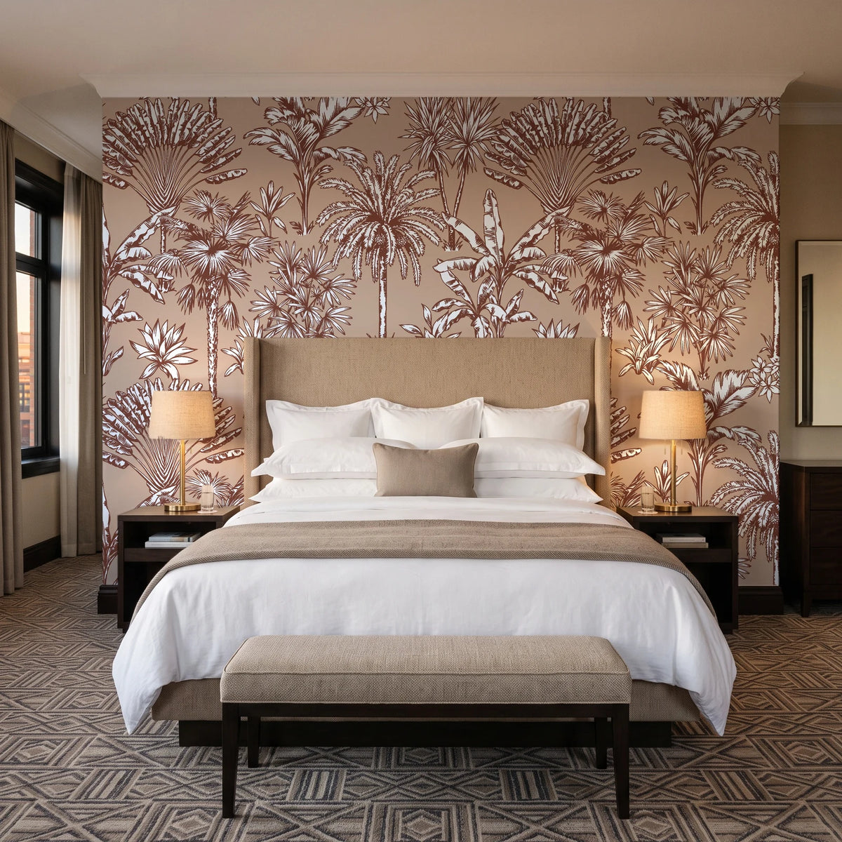 Hush & Palm Terracotta palm trees wallpaper behind the headboard of a king bed in a contemporary hotel guest room
