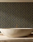 Indigo Labyrinth Midnight Gold geometric wallpaper creating ambiance in a serene spa bathroom