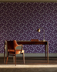 Indigo Labyrinth Plum geometric wallpaper as a feature wall in a home study