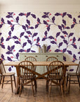 Ink & Oak Aubergine oak leaf and berry wallpaper in a farmhouse dining room with a sage sideboard and rustic trestle table