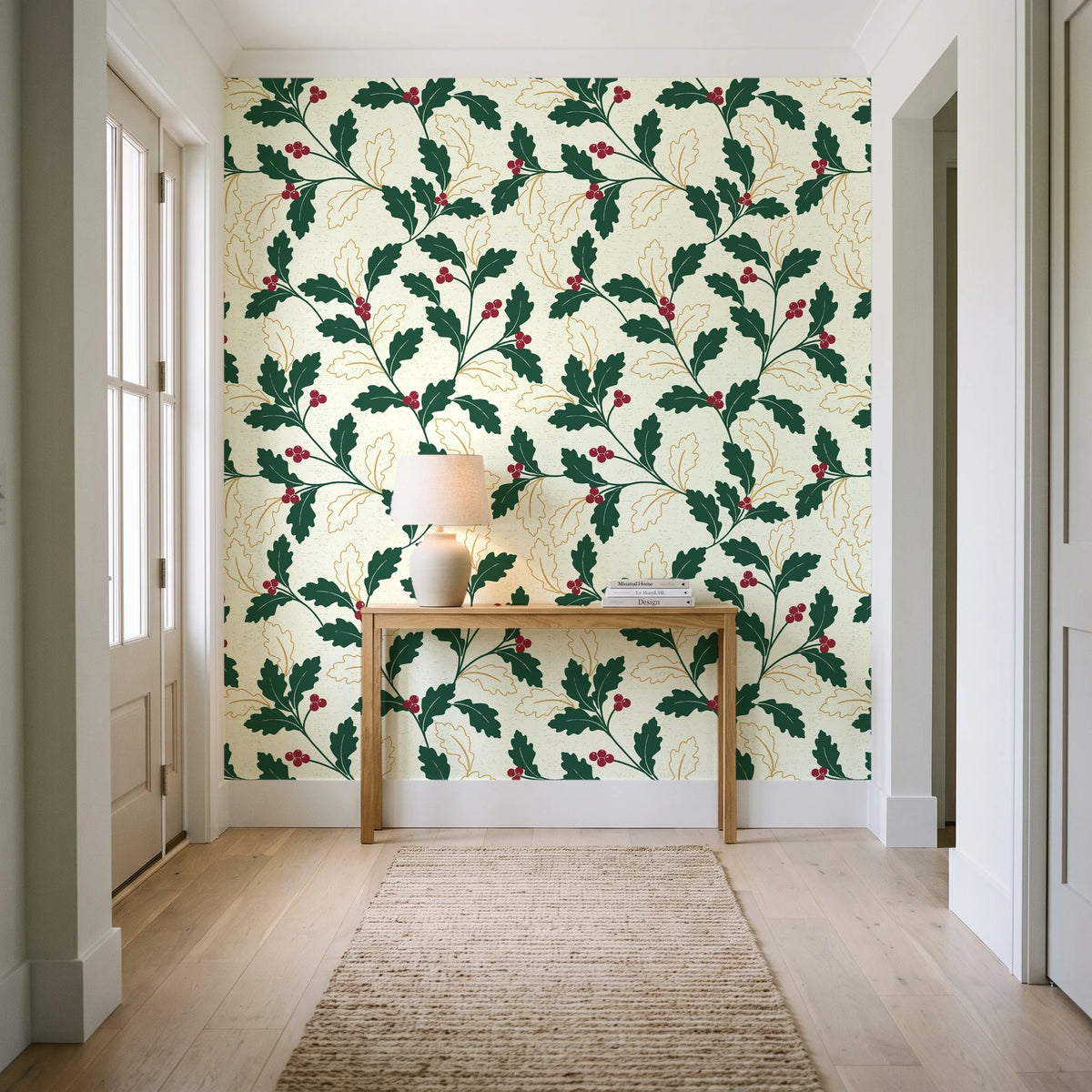 Ink & Oak Evergreen oak leaf and berry wallpaper behind a console table in a light entry hallway