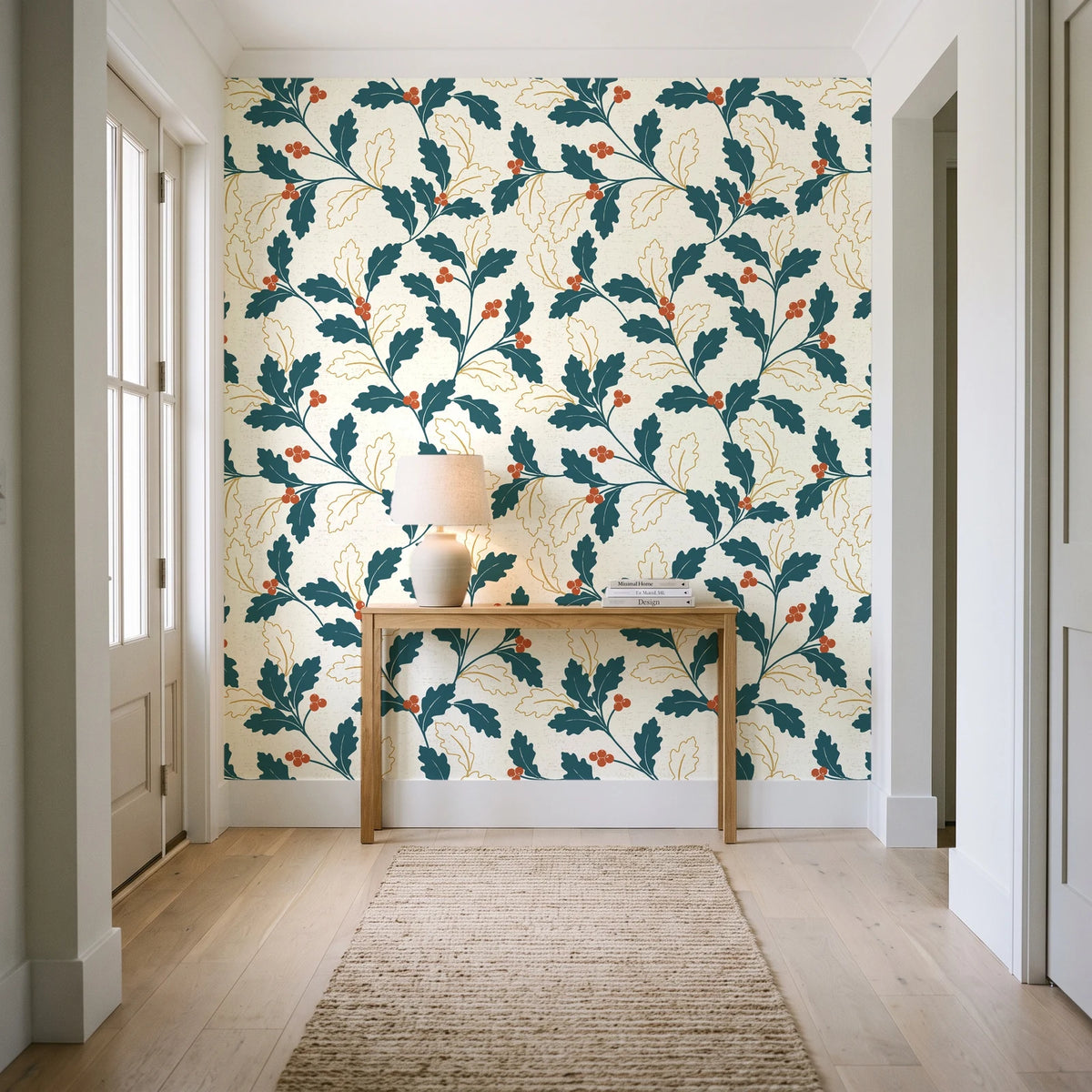 Ink & Oak Teal oak leaf and berry wallpaper behind a console table in a light entry hallway