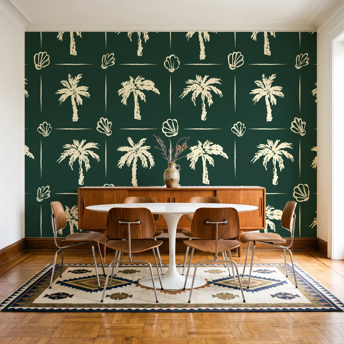 Ink & Shell Forest coastal palm and shell wallpaper in a mid-century dining room with a teak sideboard and tulip table