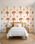 Ink & Shell Terracotta coastal palm and shell wallpaper in a bright, cheerful child's bedroom