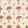 Ink & Shell Terracotta coastal palm and shell wallpaper in terracotta and sand