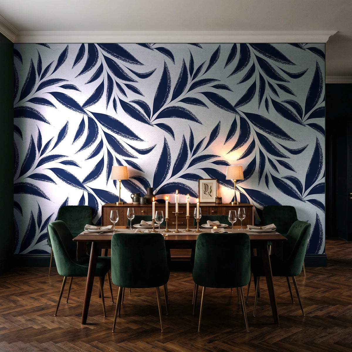 Ink Thicket Midnight bold leaf wallpaper in a dark moody dining room with a candlelit table