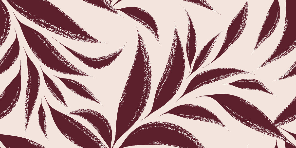 Ink Thicket Oxblood bold leaf wallpaper in oxblood and blush