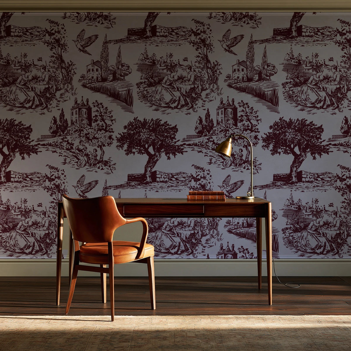 Inked Grove Oxblood pastoral toile wallpaper as a feature wall in a home study