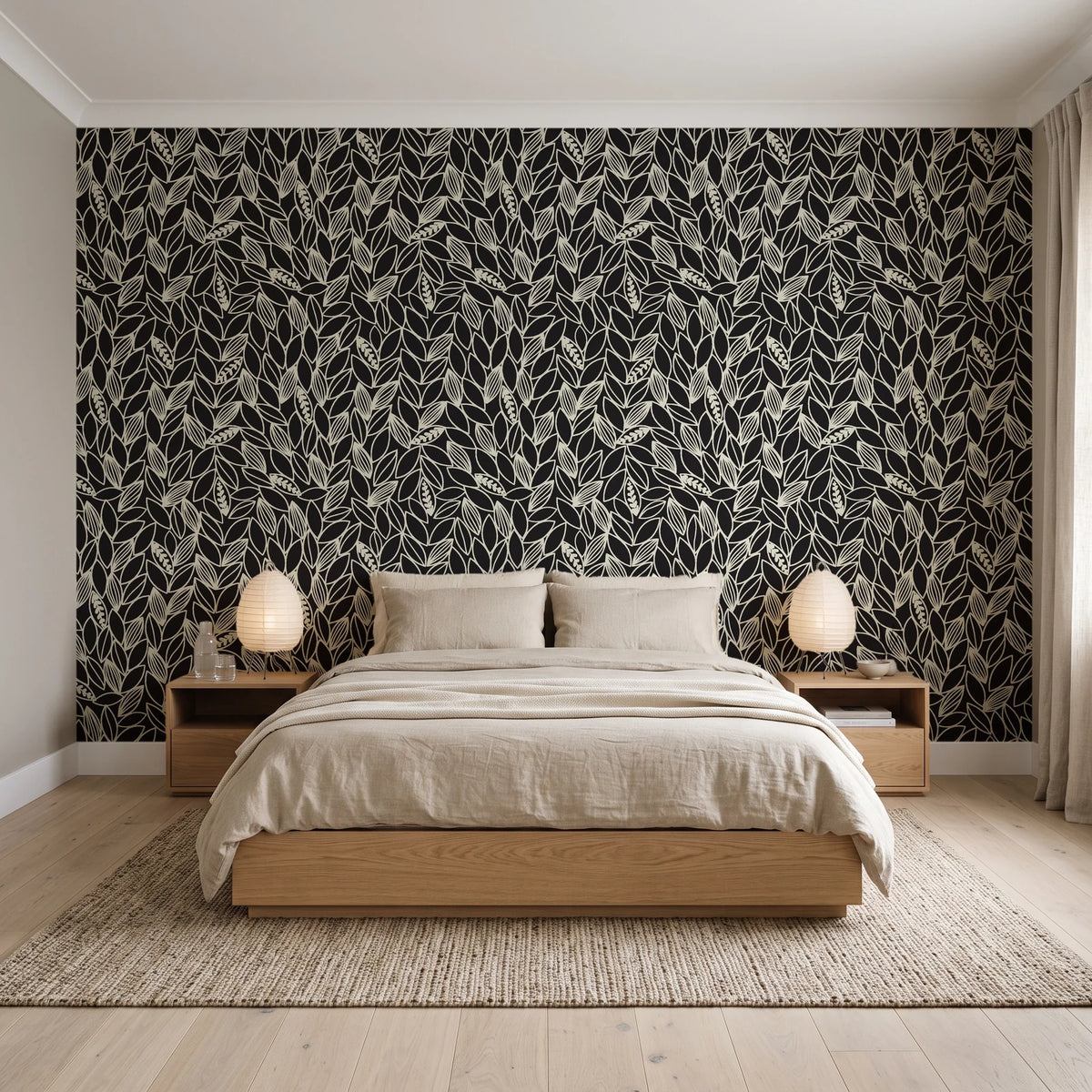 Khaki Leaf Charcoal botanical leaf wallpaper behind a low platform bed in a serene Japandi bedroom