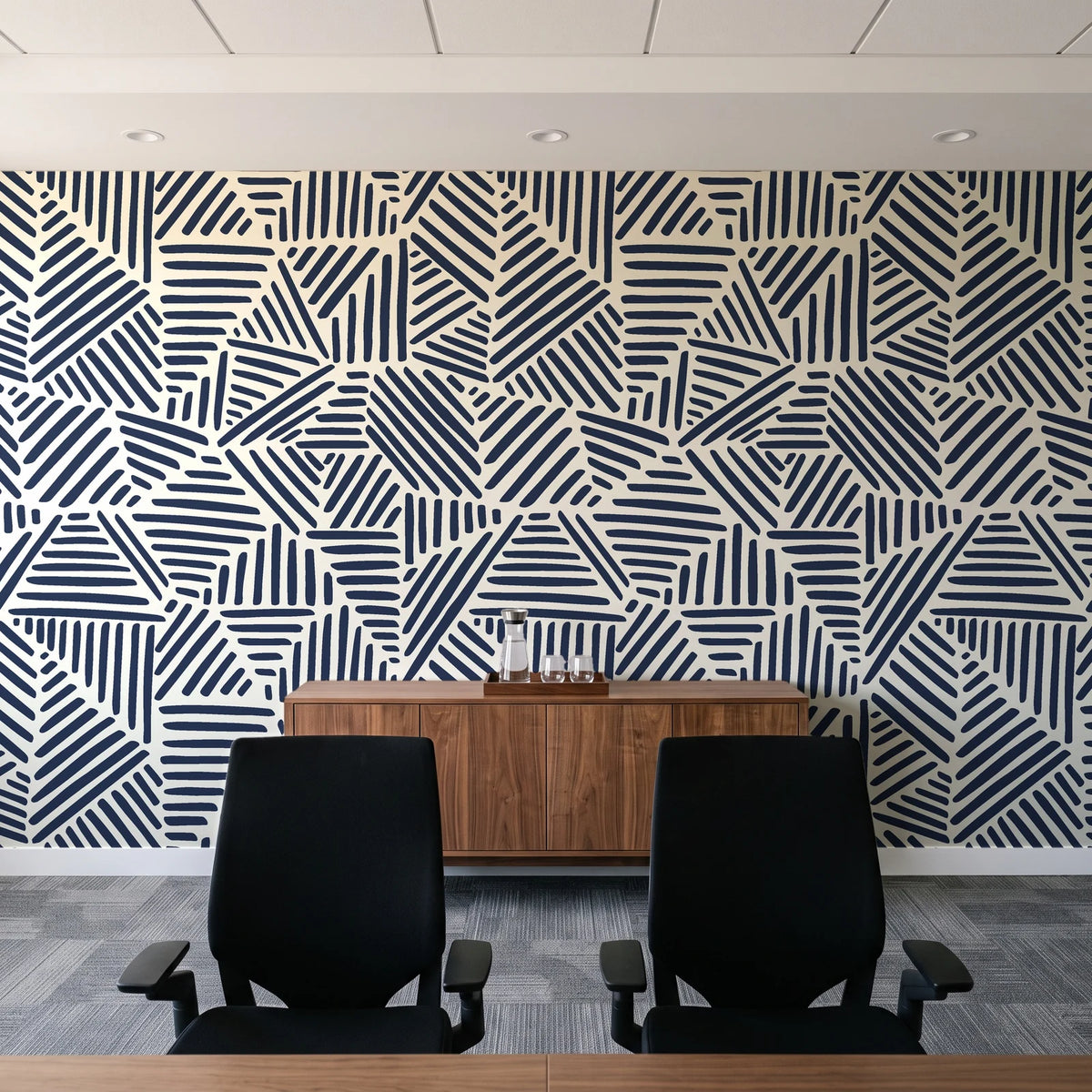 Kinetic Etch Ink hand-drawn lines wallpaper above a walnut credenza in a modern conference room