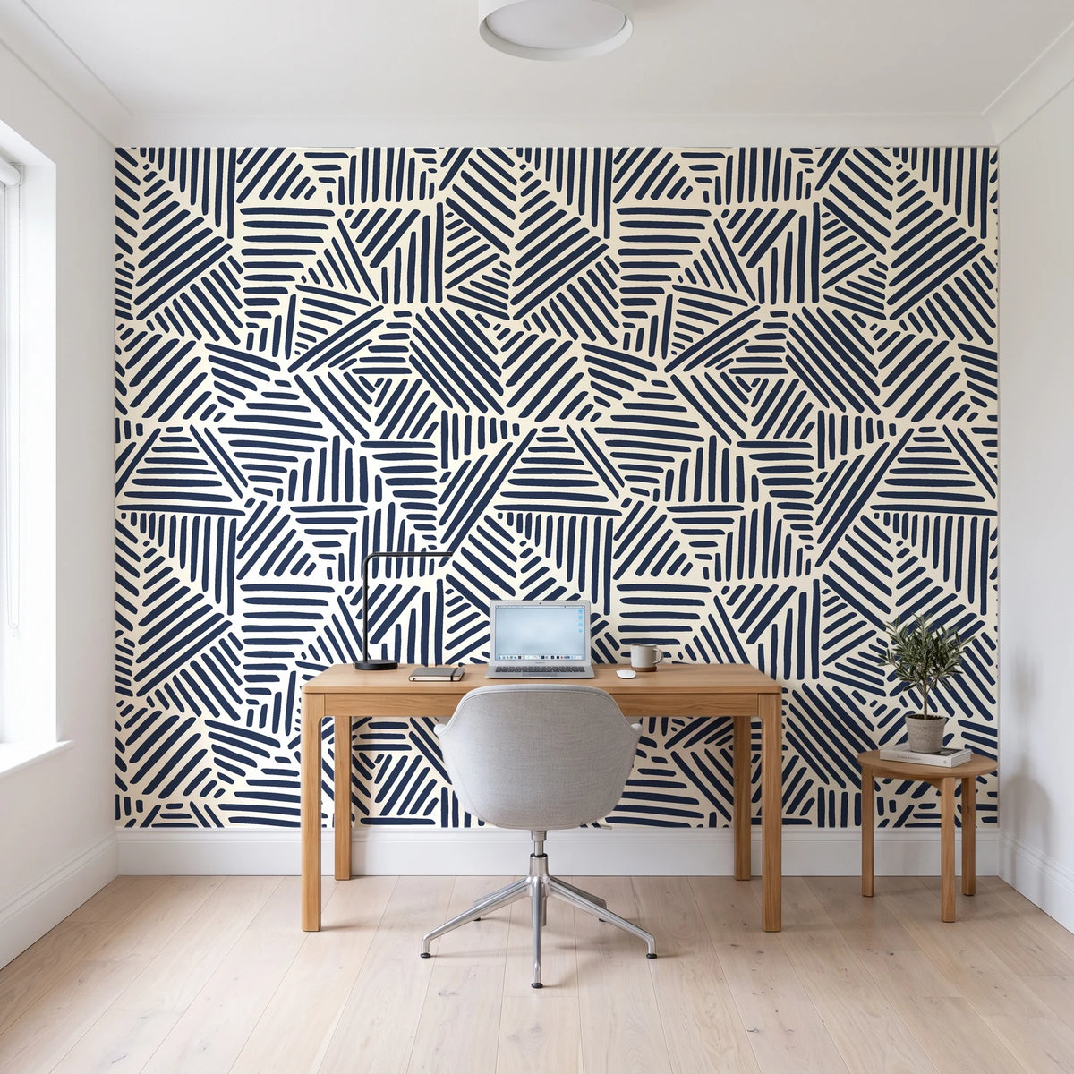 Kinetic Etch Ink hand-drawn lines wallpaper behind a modern oak desk in a bright home office