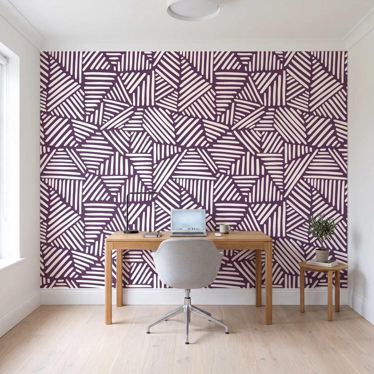 Kinetic Etch Plum hand-drawn lines wallpaper behind a modern oak desk in a bright home office