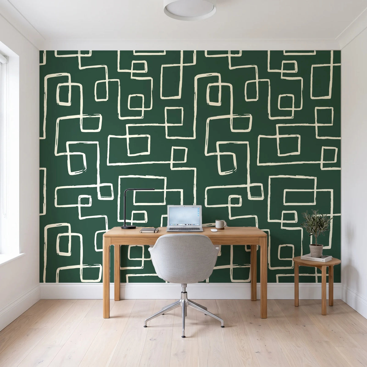 Linear Circuit Emerald minimalist line wallpaper behind a modern oak desk in a bright home office
