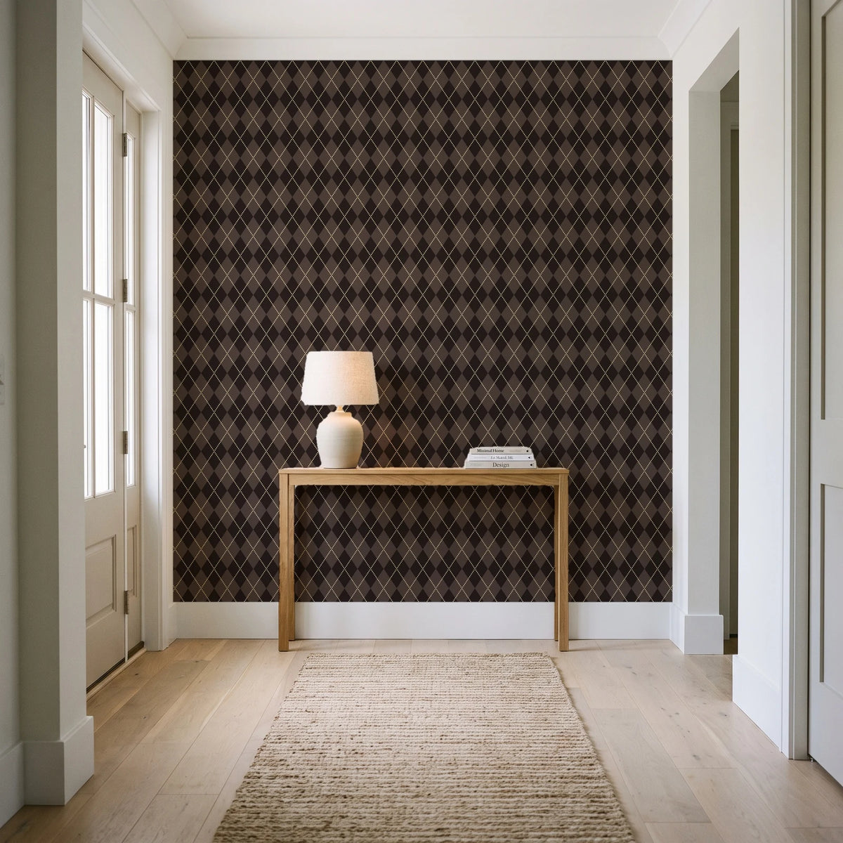 Linen Diamonds Espresso argyle wallpaper behind a console table in a light entry hallway