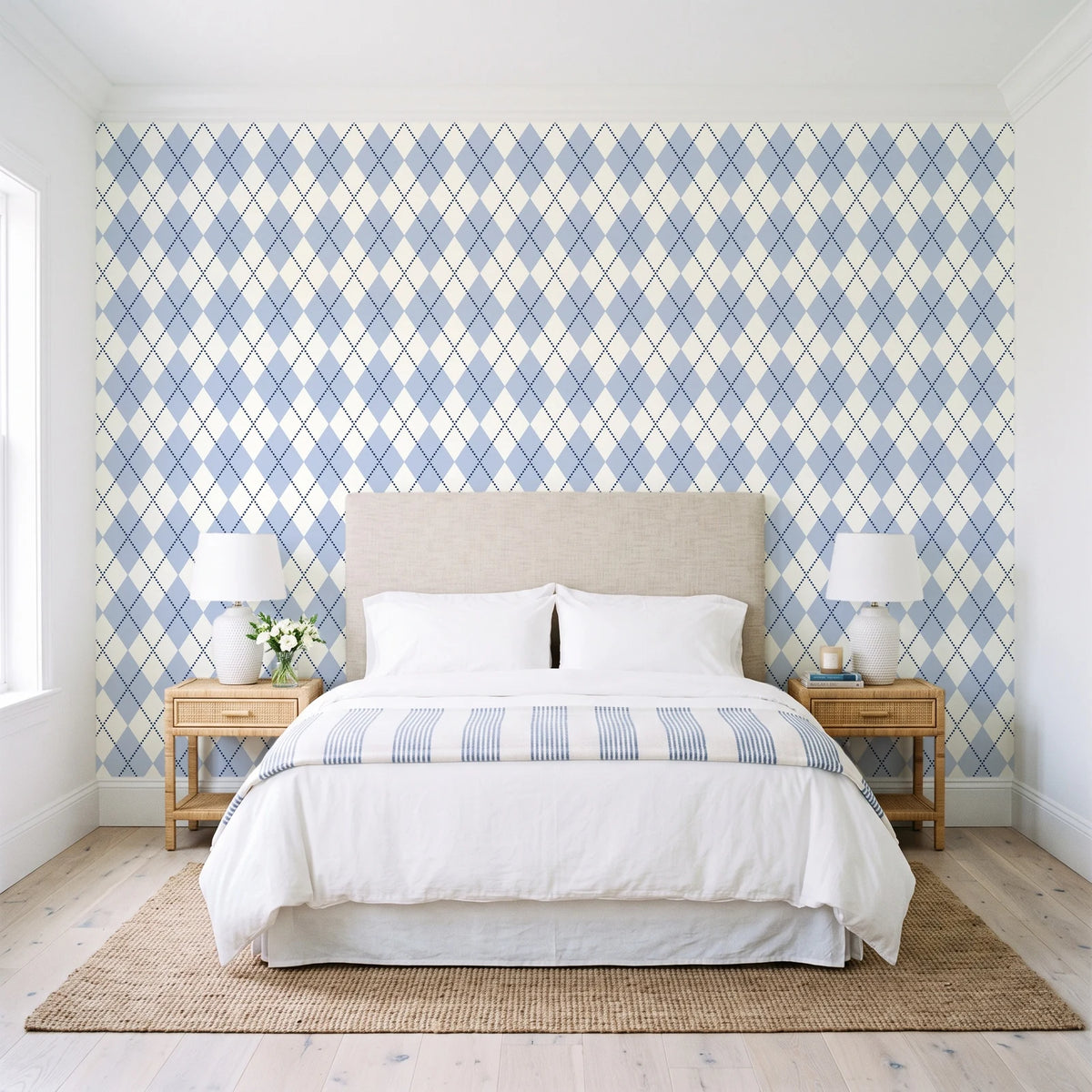 Linen Diamonds Navy argyle wallpaper behind a queen bed in a bright coastal bedroom
